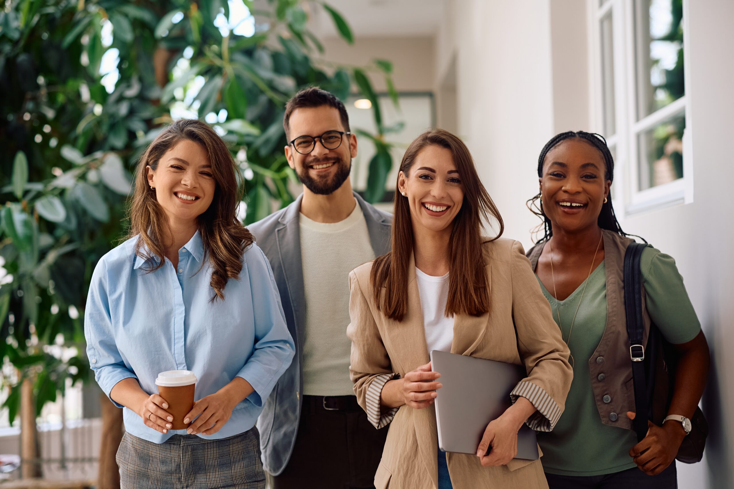 Happy,Multiracial,Group,Of,Creative,Business,People,In,The,Office